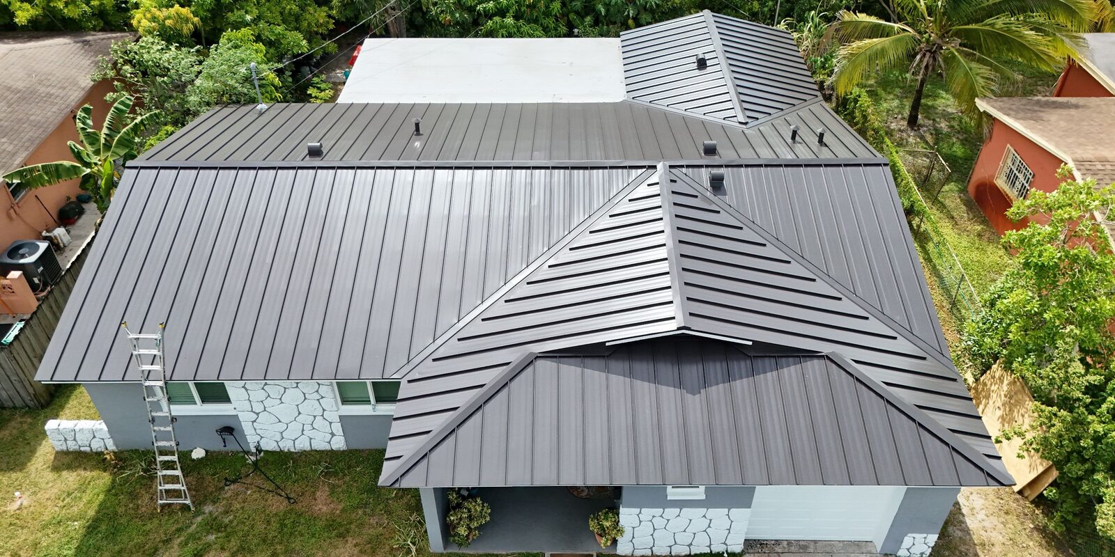 Aerial view of a dark bronze standing-seam metal roof in Lauderhill