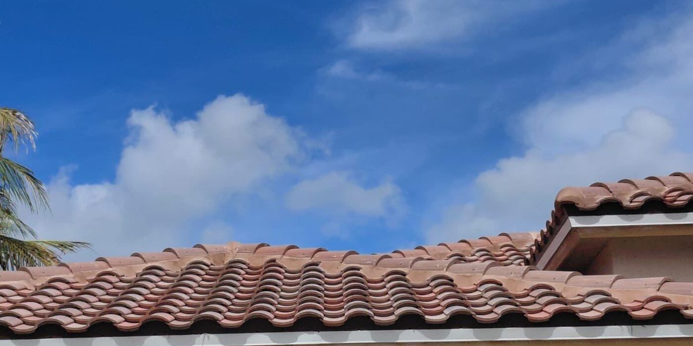 Finished concrete barrel tile roof against a blue sky in Miramar